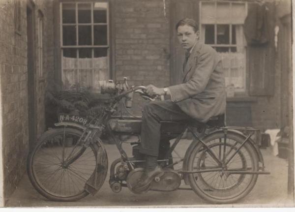 Mr Robert Owen who was born in 1901with his 1914 Model C 211cc two stroke in about 1919.