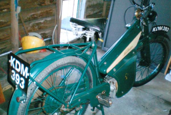 A very nicely restored 1953 New Hudson Autocycle. For sale along with a beautifully restored matching child's side car with chassis and attachments. The child's side car most likely Watsonian which is for sale with the Autocycle above.